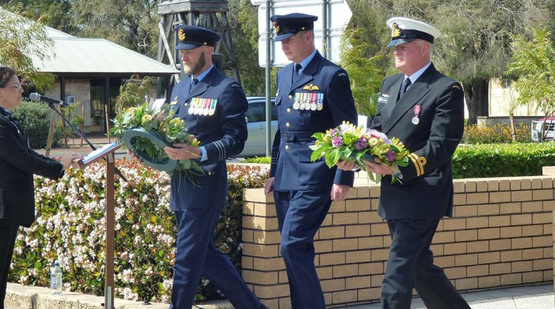 Wing Commander Paul Taylor, left, Squadron Leader Michael Leonard and Navy Lieutenant Michael Wheeler lay wreaths at the Beaufort Bomber ceremony, Busselton, WA. Story by Stephanie Hallen. Photos by Pamela Harrison.
