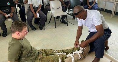 Royal Solomon Islands Police Force (RSIPF) correctional officer Olga Toata Junior demonstrates learned first-aid skills during a 'train the trainer' course at RSIPF Police Station, Rove. Story by Sergeant Felicity Richardson Major Simon Hampson. Photos by Lieutenant John Townsend.