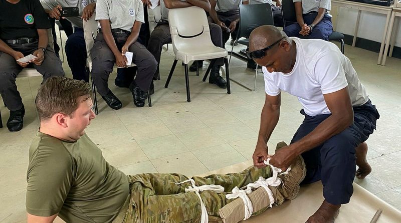 Royal Solomon Islands Police Force (RSIPF) correctional officer Olga Toata Junior demonstrates learned first-aid skills during a 'train the trainer' course at RSIPF Police Station, Rove. Story by Sergeant Felicity Richardson Major Simon Hampson. Photos by Lieutenant John Townsend.