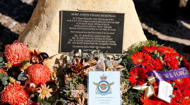 Wreaths adorn the foot of the Loxton Avro Anson Crash Memorial in Loxton, South Australia. Photos by Sergeant Nicci Freeman.