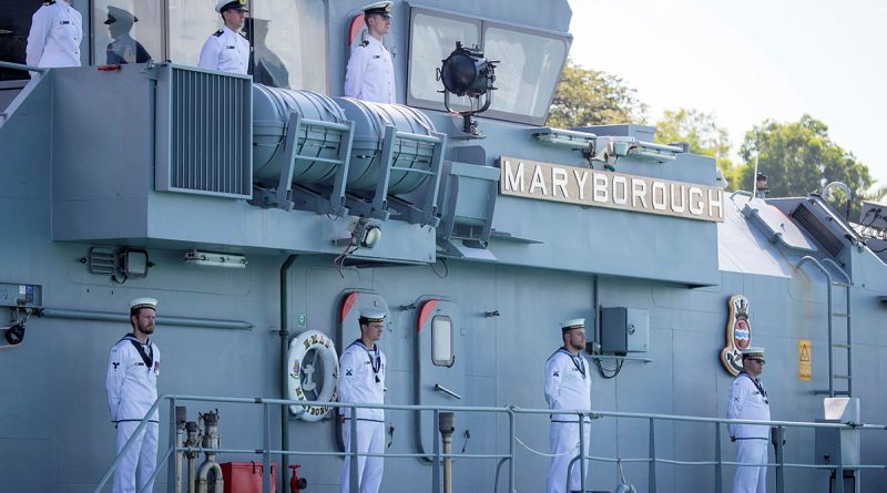 Ship's company line the upper decks of HMAS Maryborough II during its decommissioning ceremony. Story by Lieutenant Harrison Thomas. Photos by Petty Officer Leo Baumgartner.