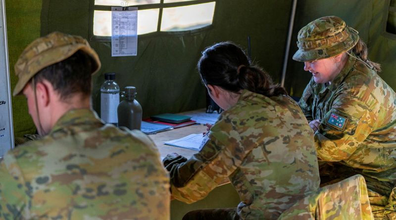 Third-year trainee officers Samuel Woods, Matilda Roberts and Emily Lewis during the ADFA Leadership Challenge Three exercise in Majura training field in Canberra. Story by Chelsey Ballard. Photos by Officer Cadet Mikaela Cox.