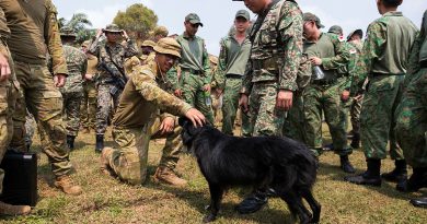 Australian Army personnel meet Bruno, a military working dog, on Exercise Bersama Lima, Kuantan, Malaysia. Story by Flying Officer Connor Bellhouse. Photo by Corporal Sam Price.