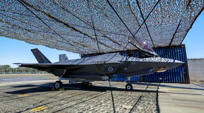 An F-35A Lightning II aircraft under a temporary aircraft revetment, which is being trialled at RAAF Base Williamtown, NSW. Story by Flight Lieutenant Rob Hodgson. Photos by Sergeant Craig Barrett.