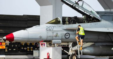A RAAF aviator finalises a systems check of an F/A-18F Super Hornet at Royal Malaysian Air Force Base Butterworth during Exercise Bersama Lima, Malaysia. Story by Flying Officer Connor Bellhouse. Photos by Corporal Sam Price.