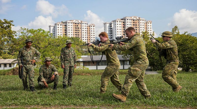 Australian Army soldiers demonstrate fire and movement for personnel from the Malaysian Armed Forces during Exercise Harringaroo, Malaysia. Story by Flying Officer Connor Bellhouse. Photos by Corporal Sam Price.