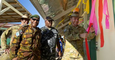 Brigadier David McCammon, right, officially opens renovated classrooms with Papua New Guinea Defence Force (PNGDF) representatives during Exercise Puk Puk, Manus Island, PNG. Story by Major Taylor Lynch. Photos by Lance Corporal Riley Blennerhassett.