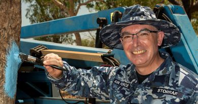 Officer Commanding Health Services Wing Group Captain Glen Storrar helps paint a tree in support of the Blue Tree Project at a barbecue promoting mental health in Derby in Western Australia. Story by Flight Lieutenant Jessica Winnall. Photos by Sergeant Murray Staff.