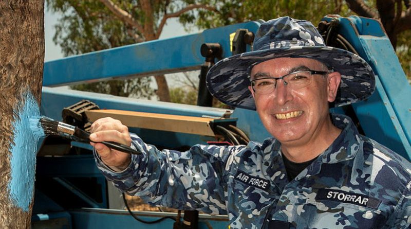 Officer Commanding Health Services Wing Group Captain Glen Storrar helps paint a tree in support of the Blue Tree Project at a barbecue promoting mental health in Derby in Western Australia. Story by Flight Lieutenant Jessica Winnall. Photos by Sergeant Murray Staff.