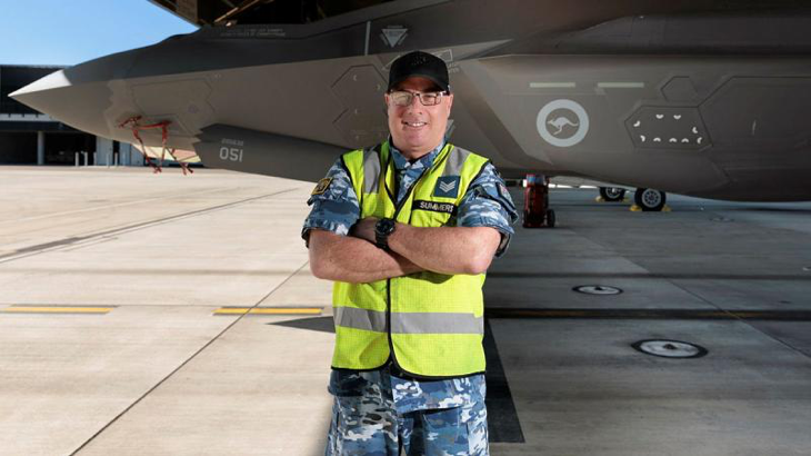 Sergeant Andrew Summers in front of a F-35A Lightning II at 2 Operational Conversion Unit, RAAF Base Williamtown, NSW. Story by Squadron Leader Bruce Chalmers. Photo by Aircraftman Kurt Lewis.