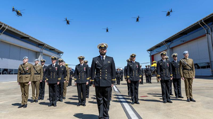 Five EC-135 helicopters conduct a fly past on completion of the Joint Helicopter School Course 012 graduation ceremony at 723 Squadron, HMAS Albatross. Photo by Petty Officer Justin Brown.