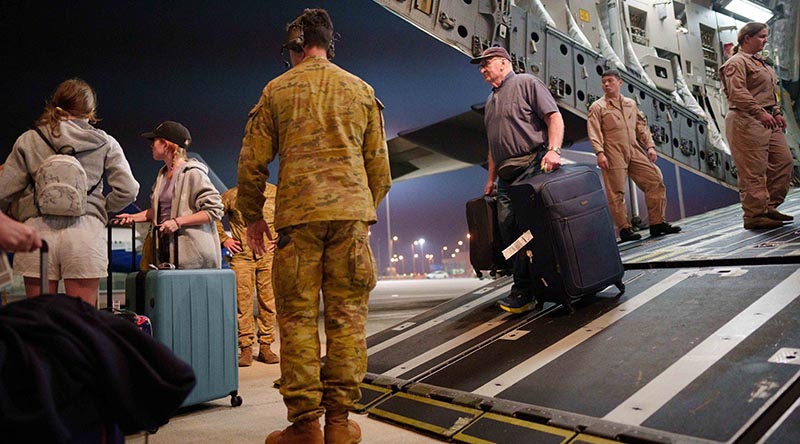 A Royal Australian Air Force C-17A Globemaster III offloads Australian citizens, their families and other approved foreign nationals from Israel after an 'assisted-departure flight' from Israel (on 15 October 2023). Photo by Corporal Robert Whitmore.