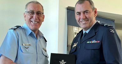 Warrant Officer Don Kenny, left, is presented with his Defence Long Service Medal, sixth bar (2nd Federation Star), by Chief of Staff Air Force Headquarters Air Commodore James Badgery. Story by Flight Lieutenant Nick O’Connor.
