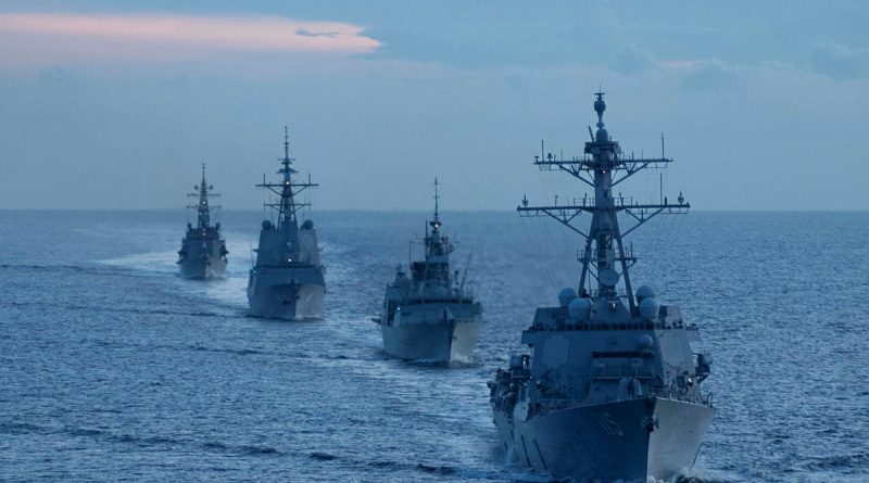 USS Rafael Peralta leads a formation sail with HMCS Ottowa, HMAS Brisbane and JS Akebono during Exercise Noble Caribou in the South China Sea. Story by Lieutenant Commander Andrew Herring. Photo from Royal Canadian Navy.