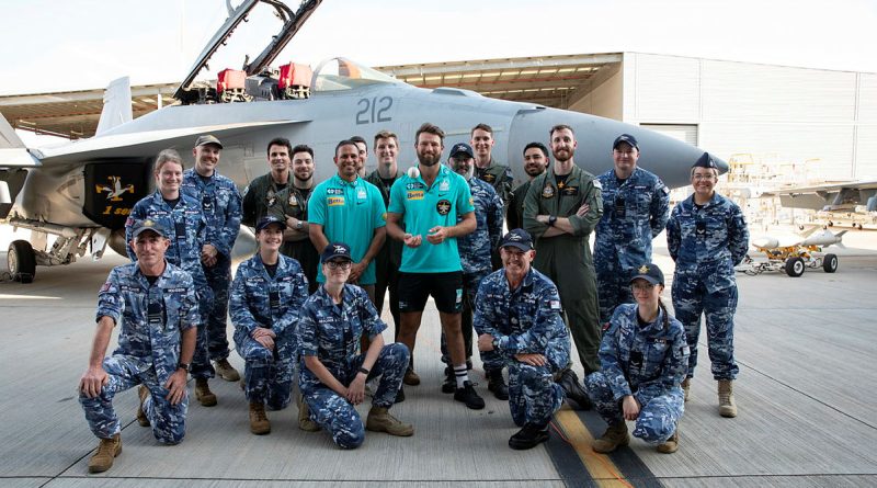 Brisbane Heat cricket players Usman Khawaja and Michael Neser with RAAF aviators during their visit to RAAF Base Amberley, Queensland. Story by Flight Lieutenant Rob Hodgson. Photos by Leading Aircraftwoman Taylor Anderson.
