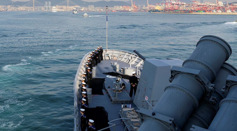 HMAS Toowoomba personnel stand at ease at the forecastle as the ship arrives at Busan Naval Base, South Korea, for Exercise Haedoli Wallaby. Photos by Leading Seaman Ernesto Sanchez.