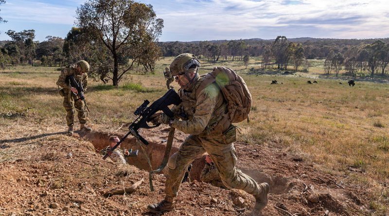 A soldier from the 22nd Engineer Regiment guards an "enemy" combatant during Exercise Platypus Survives at Puckapunyal Military Training Area. Story by Sergeant Matthew Bickerton. Photos by Corporal Michael Currie.