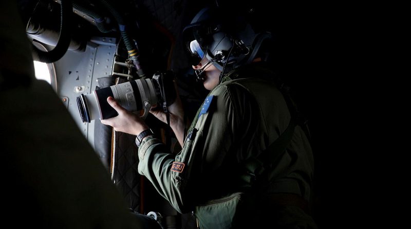 Loadmaster Corporal Mitchell Hordern of 35 Squadron photographs vessels out of a RAAF C-27J Spartan during Operation Solania. Story by Captain Peter Nugent. Photos by Leading Aircraftwoman Maddison Scott.