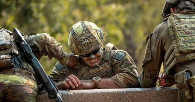 Australian Army troopers from the 2nd/14th Light Horse Regiment (Queensland Mounted Infantry) help a mate over a 10-foot wall, during the 7th Brigade Military Skills Competition at Gallipoli Barracks, Brisbane. Story by Captain Cody Tsaousis. Photo by Corporal Nicole Dorrett.