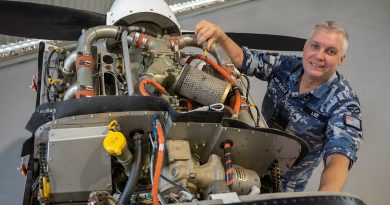 Squadron Leader Mark Lees works on a CT4A as the 100 Squadron senior engineering officer at RAAF Base Point Cook in 2022. Story by Leading Aircraftwoman Casey-Lee Rebellato. Photo by David Jones.