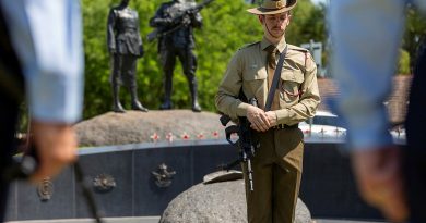 A soldier rests on arms during a service marking the 10th anniversary of the dedication of the Aboriginal and Torres Strait Islander War Memorial in Adelaide. Story by Pilot Officer Shanea Zeegers . Photo by Sergeant Nicci Freeman.