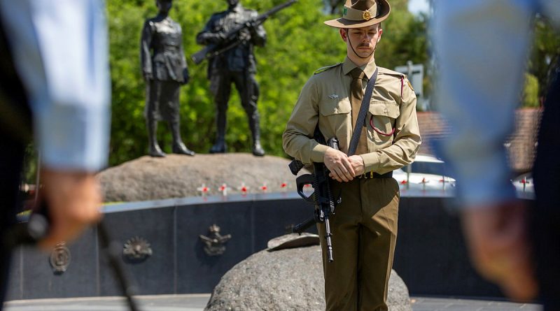 A soldier rests on arms during a service marking the 10th anniversary of the dedication of the Aboriginal and Torres Strait Islander War Memorial in Adelaide. Story by Pilot Officer Shanea Zeegers . Photo by Sergeant Nicci Freeman.