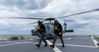 Leading Seaman Kalani Brinkmeier (left) and Able Seaman Samuel Speakman from HMAS Toowoomba on the flight deck during flying operation as part of Operation Argos. Photo by Leading Seaman Ernesto Sanchez.