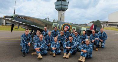 Personnel from 453 Squadron with a Supermarine Spitfire Mk XVI from 100 Squadron at RAAF Base Williamtown, NSW. Image has been digitally manipulated, 453 Squadron sign added to ATC tower. Story by Flying Officer Kristi Adam. Photo by Leading Aircraftman Kurt Lewis.