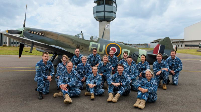 Personnel from 453 Squadron with a Supermarine Spitfire Mk XVI from 100 Squadron at RAAF Base Williamtown, NSW. Image has been digitally manipulated, 453 Squadron sign added to ATC tower. Story by Flying Officer Kristi Adam. Photo by Leading Aircraftman Kurt Lewis.