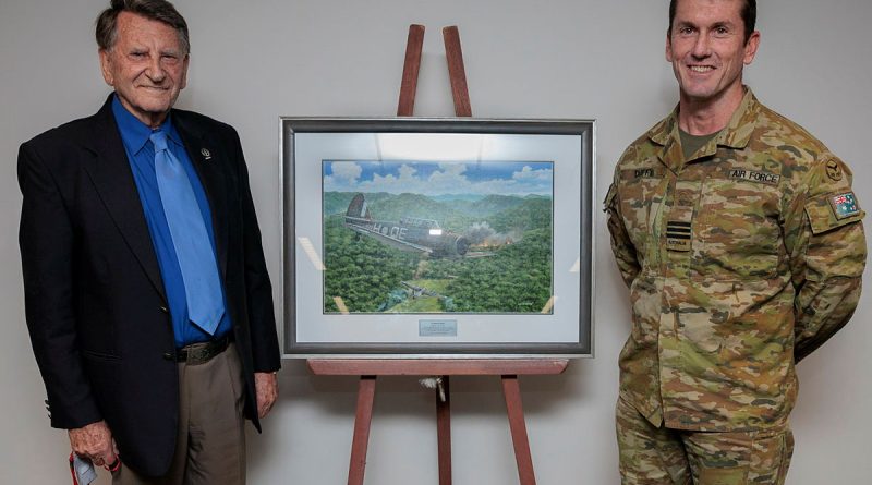 Garry Cooper and Commanding Officer 4 Squadron Wing Commander Steven Duffy unveil a painting commissioned by aviation artist Ivan Berryman at 4 Squadron, RAAF Base Williamtown, NSW. Story by Flying Officer Jamie Wallace. Photos: Leading Aircraftman Kurt Lewis.