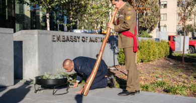 Australian Army soldier Sergeant Lachlan Youll plays the didgeridoo at the opening of the The Australian Embassy in Washington DC. Story by Captain Katy Manning.