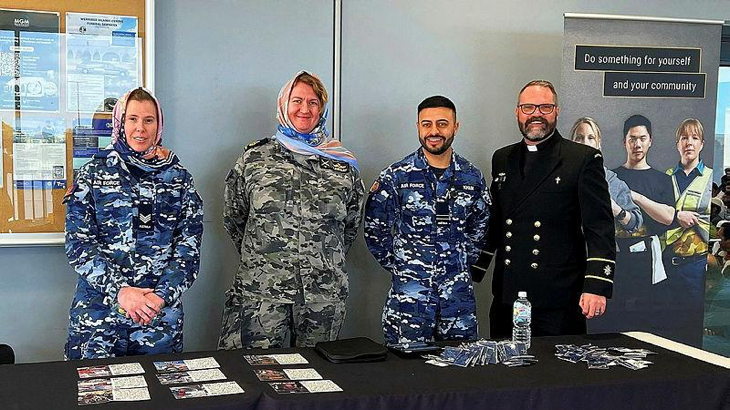 Sergeant Brodie Stewart, left, Chief Petty Officer Sarah Lindsay, Flight Lieutenant Abdul Khan and Chaplin Darren Cronshaw engage with community members at the Melbourne Grand Mosque. Story by By Flight Lieutenant Abdul Khan.