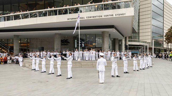 Members from Australia’s Federation Guard prepare for a ceremonial sunset during the Sea Power Conference closing ceremony in Sydney. Story by Lieutenant Commander Ben Willee. Photo by Able Seaman Lucinda Allanson.