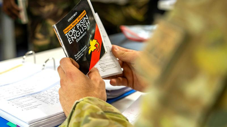 An Australian Army special operations force soldier studies Tok Pisin during language training at the ADF School of Special Operations at Holsworthy Barracks in Sydney. Photo by Corporal Dustin Anderson.