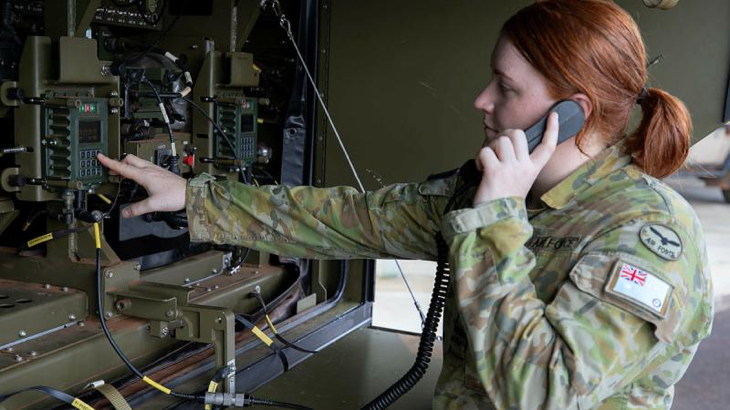Air battle manager Flying Officer Kim Petterson performs start-up checks on a G-Wagon Command Post Module being trialled under Project Bandicoot. Story by Corporal Veronica O'Hara. Photo by Sergeant Pete Gammie.