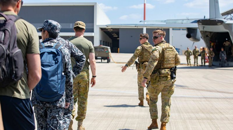 Personnel from 2 Security Forces Squadron take part in an aircraft security operations course on the flightline at RAAF Base Amberley, Queensland. Story by Flight Lieutenant Greg Hinks. Photo by Leading Aircraftwoman Taylor Anderson.
