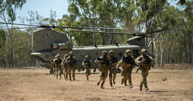 Soldiers from 1st Battalion, The Royal Australian Regiment disembark a CH-47 Chinook during Exercise Green Blaze at Townsville Field Training Area. Story by Corporal Jacob Joseph . Photo by Trooper Dana Millington.