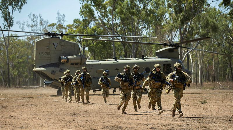 Soldiers from 1st Battalion, The Royal Australian Regiment disembark a CH-47 Chinook during Exercise Green Blaze at Townsville Field Training Area. Story by Corporal Jacob Joseph . Photo by Trooper Dana Millington.
