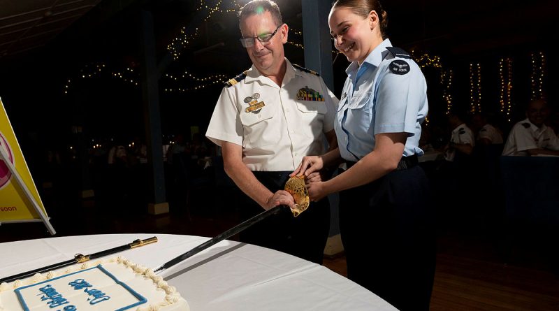 Commander Air Mobility Group Air Commodore Bradley Clarke and Aircraftwoman Jorja Winterford cut the cake during the annual Air Mobility Group Pathfinder Awards Dinner at RAAF Base Richmond. Story by Tastri Murdoch. Photos by Leading Aircraftman Chris Tsakisiris.
