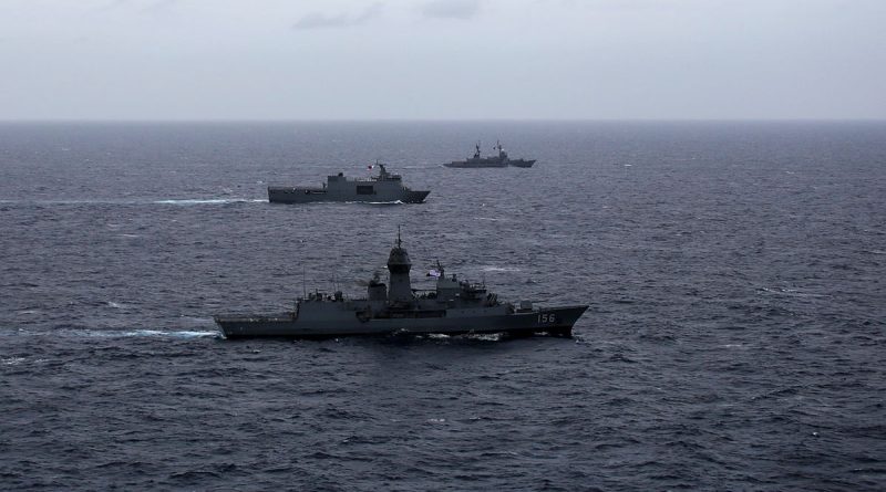 Philippine Navy ships BRP Davao Del Sur, centre, and BRP Gregorio Del Pilar, back, conduct a maritime cooperative activity with HMAS Toowoomba during a regional presence deployment. Story by Squadron Leader Bel Culley.