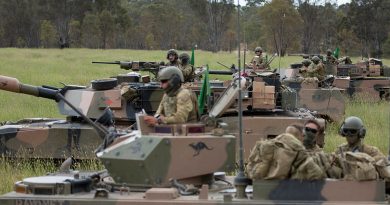 Australian Army soldiers prepare for a combat team quick attack with M1A1 Abrams and M113AS4 armoured personnel carriers during Exercise Iron Warrior 23 at Puckapunyal. Story and photos by Corporal Michael Rogers.