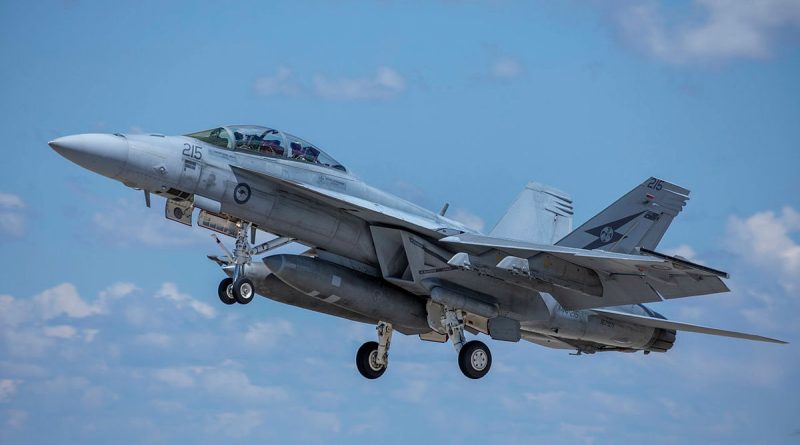 An F/A-18F Super Hornet from 1 Squadron takes off from RAAF Base Tindal during Exercise Crimson Dawn. Story by Pilot Officer Shanea Zeegers. Photos by Sergeant David Gibbs.
