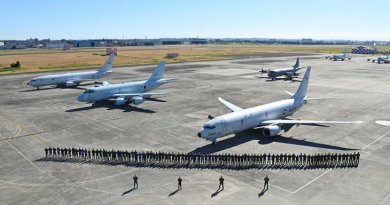 Crews and support personnel at NAF Atsugi base in Japan during Exercise AnnualEx 2023. Behind them are a RAAF P-8A Poseidon, left, Japan Maritime Self-Defense Force P-1, centre, Royal Canadian Air Force CP-140 Aurora, mid-ground, and United States Navy P-8 Poseidon, right. Photo: Japan Maritime Self-Defense Force. Story by Flight Lieutenant Claire Burnet.