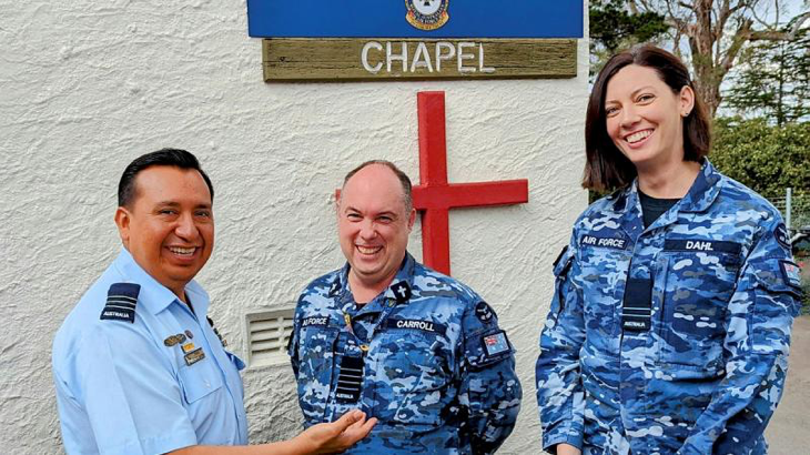 From left, Wing Commander Ivan Benitez-Aguirre, Group Captain John Carroll and Flight Lieutenant Laura Dahl at the entrance to the newly reopened RAAF Base Glenbrook chapel. Story by Flight Lieutenant Katrina Thomasson.