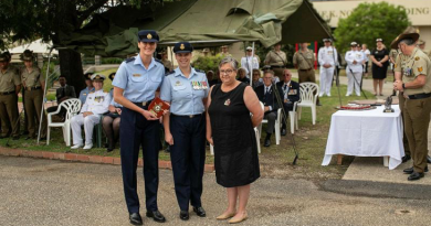 RAAF Aircraftwoman Eloise Hiller-Stanbrook (left) receiving the Sergeant Wendy Jones award from Flight Lieutenant Brook Steege (middle) and Alison Meade at the Army School of Health graduation at Latchford Barracks. Story by Corporal Luke Bellman. Photo by Lance Corporal Tyson Grant.