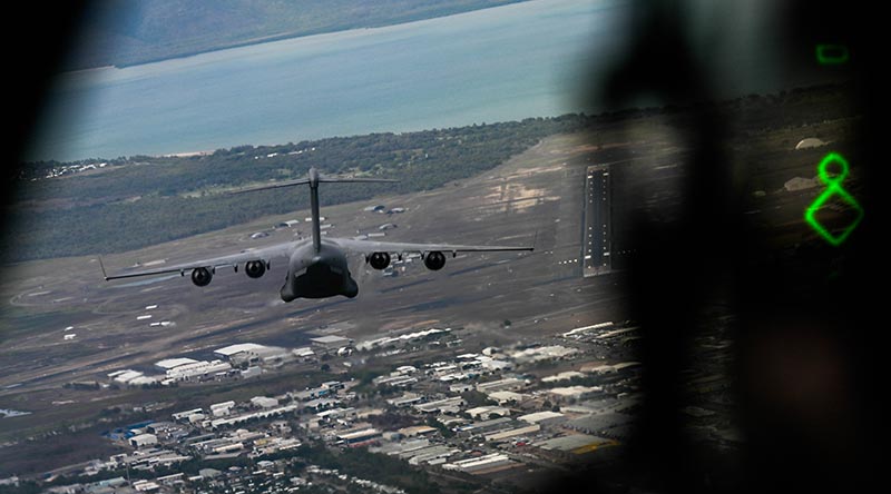 View from a United States Air Force C-17A Globemaster III cockpit of a Royal Australian Air Force C-17A about to conduct an assault landing at RAAF Base Townsville during Exercise Global Dexterity 23-2. Photo by Senior Airman Mackenzie Cooper.