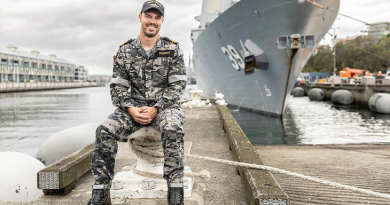 Engineering Officer Lieutenant Parritt in front of HMAS Hobart, Sydney, NSW. Story by Corporal Jacob Joseph. Photo by Able Seaman Lucinda Allanson.