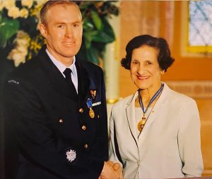 Ian 'Blue' Macgregor congratulated by NSW Governor Marie Bashir.