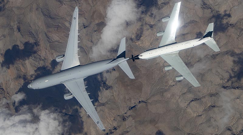 A Royal Australian Air Force KC-30A Multi-Role Tanker Transport from No 33 Squadron (left) conducts air-to-air refuelling trials with a United States Air Force Boeing RC-135. Photo supplied by USAF.