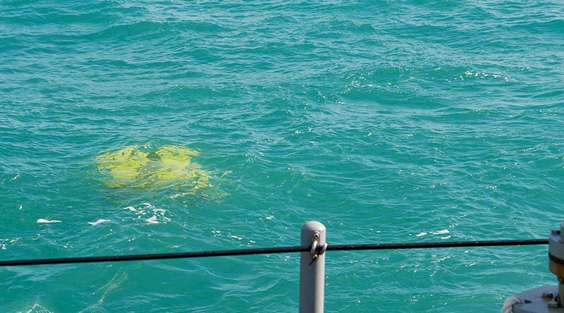 HMAS Huon deploys an underwater sensor. Photo by Able Seaman Casey Buurveld.